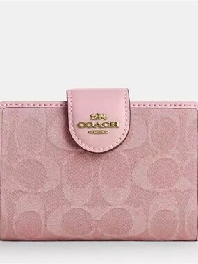 Coach Pink denim medium zip wallet